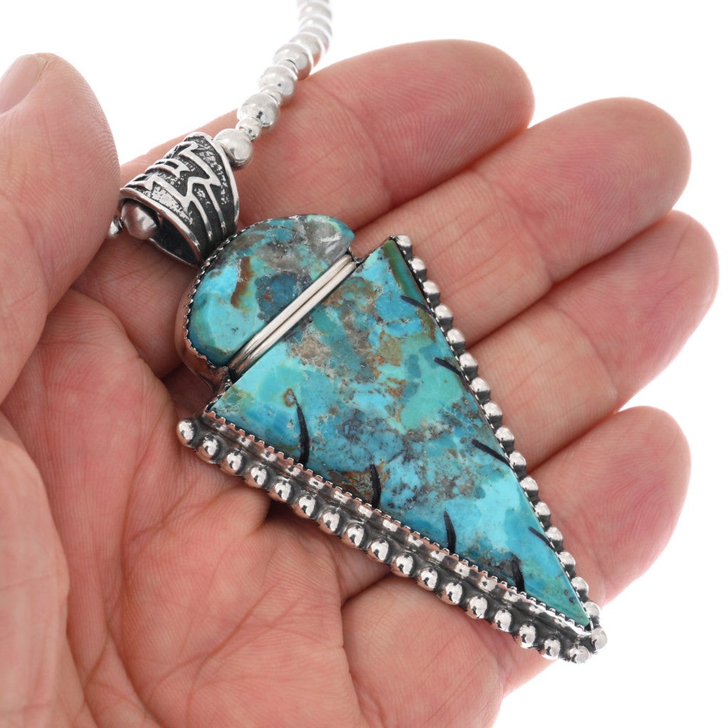Hand Carved Turquoise Arrowhead Pendant